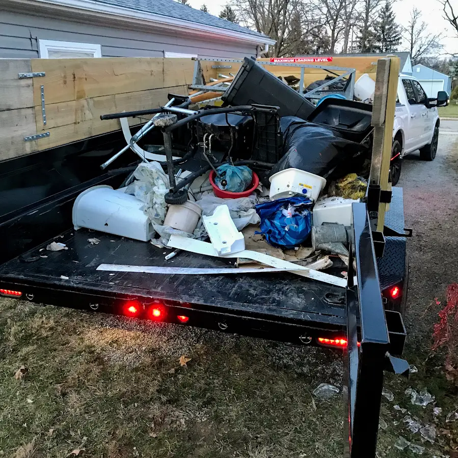 Roll-off dumpster delivered to a residential driveway in Wisconsin Rapids