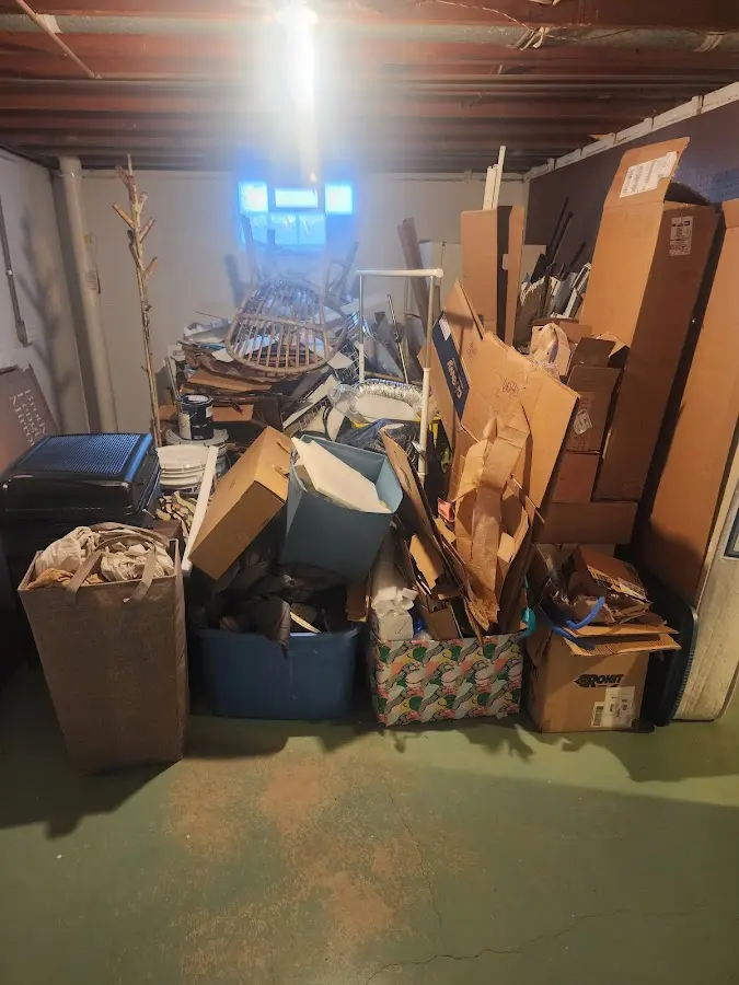 Roll-off dumpster container at job site for 4 Yard Dumpster Rental in Wisconsin Rapids